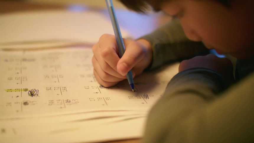 A child working on math homework