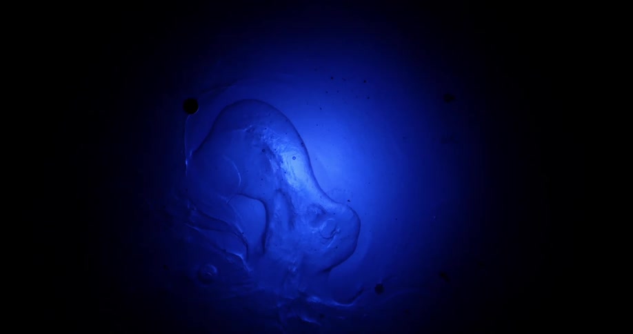 A blue circular outline with liquid flowing