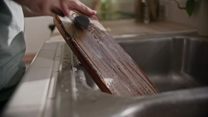 A man doing dishes at home
