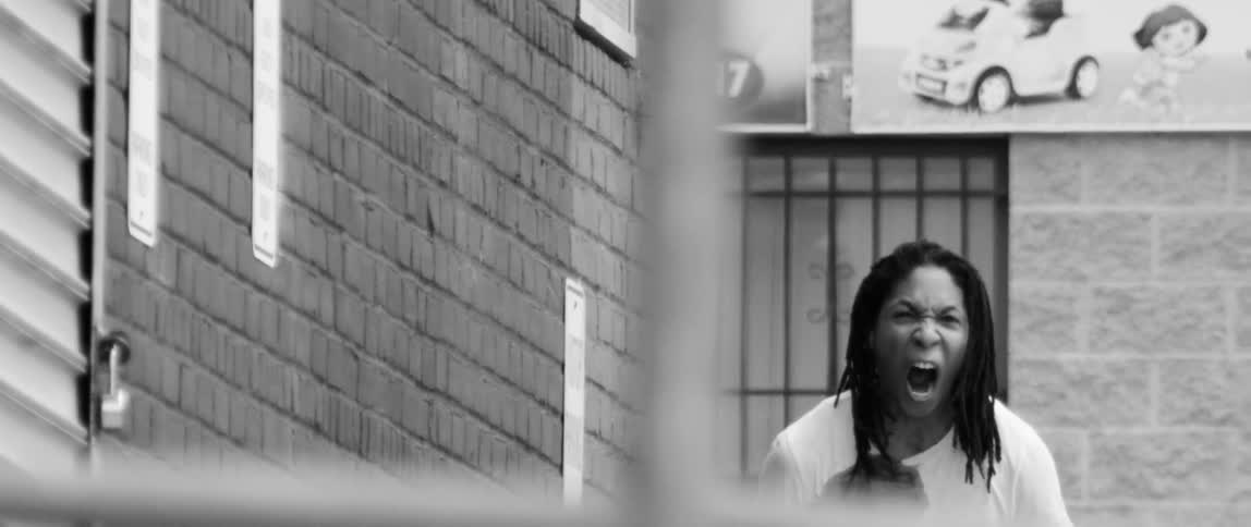 A person with a bullet hole in his chest screams
