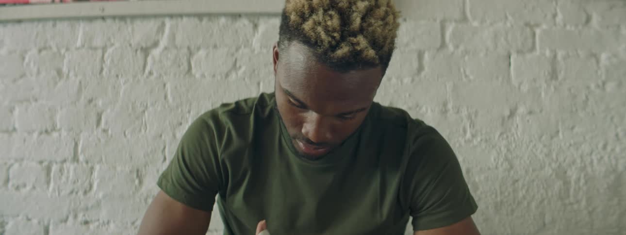 A man wrapping his hands with a wrap