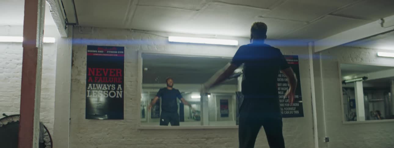 A man working out in a mirror