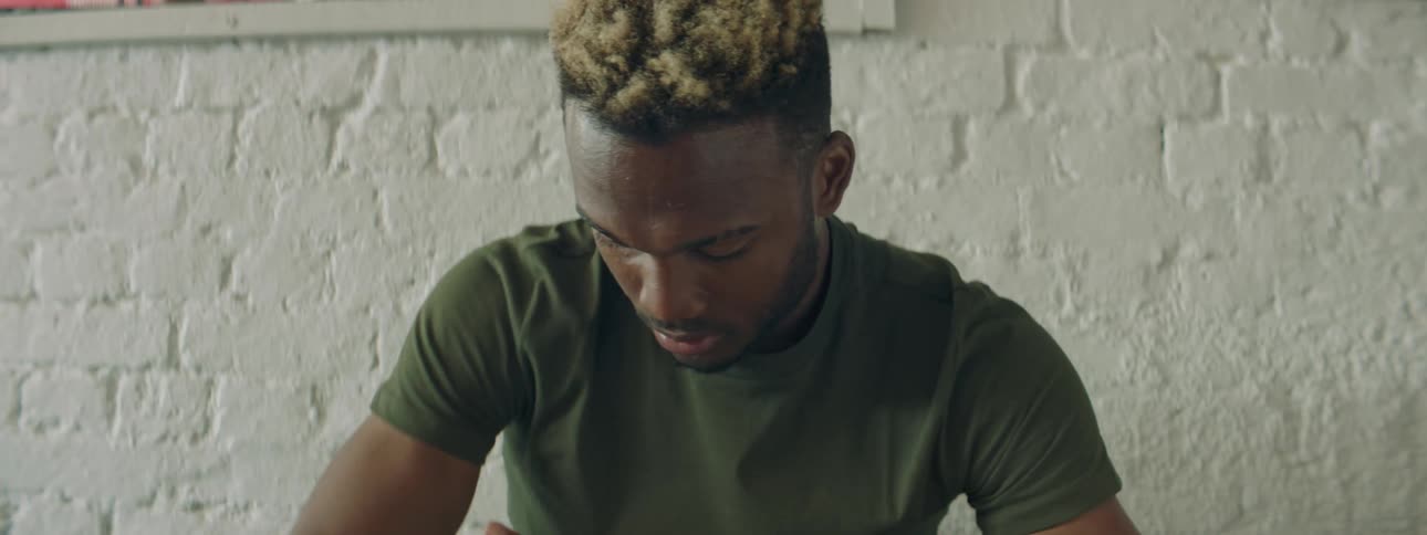 A young man wrapping his hand