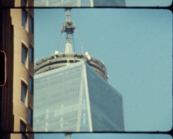 A city with buildings and skyscrapers with the sky and clouds in the background