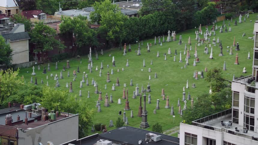 A cemetery in a city during the day