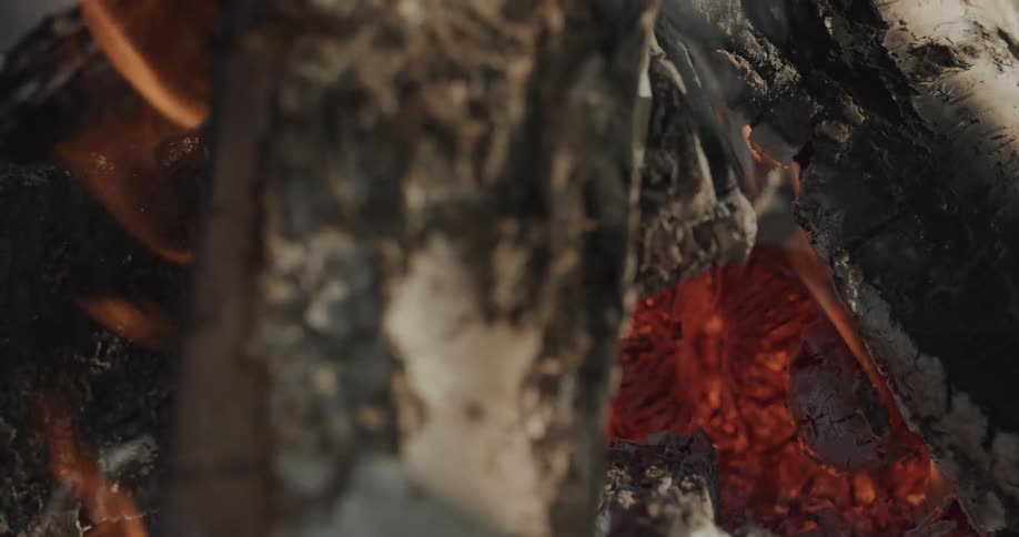 A bonfire with ashes and smoke