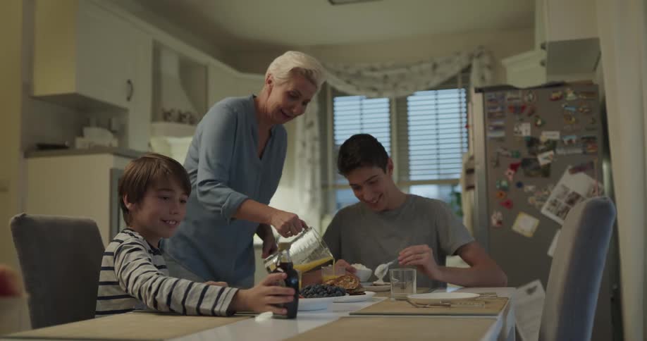 A family preparing to eat breakfast