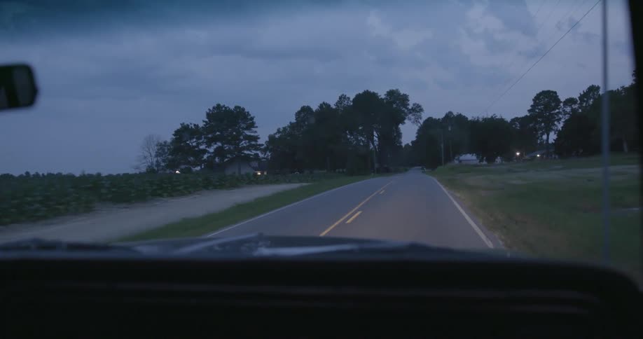 A car driving down a road