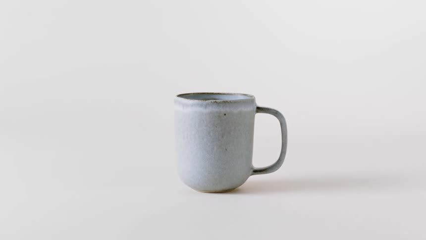 White coffee mug with a handle