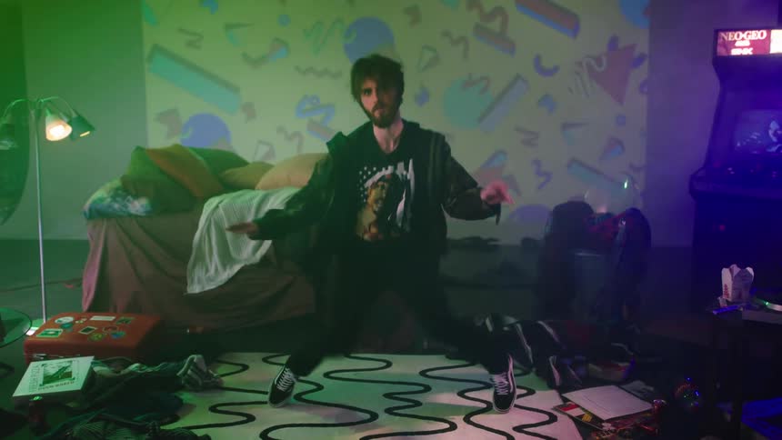 A man dancing in a retro room