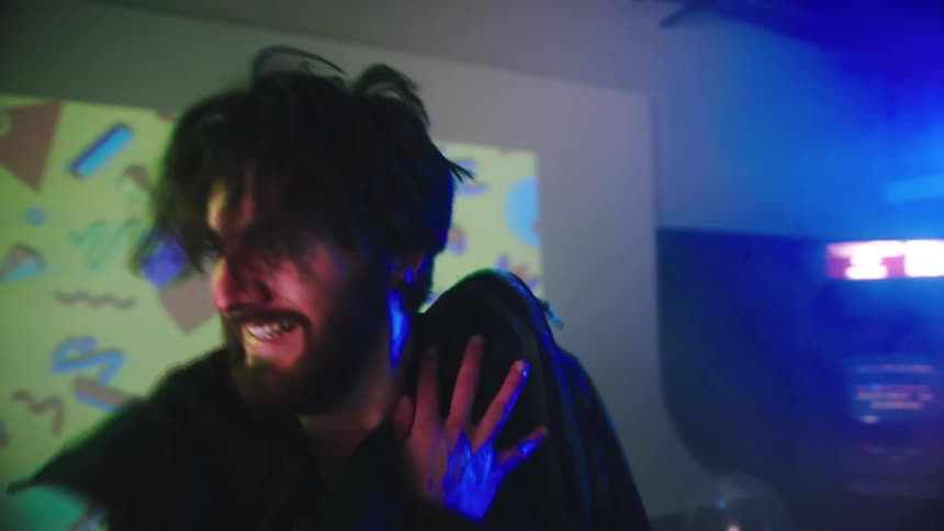 A man in a room dancing
