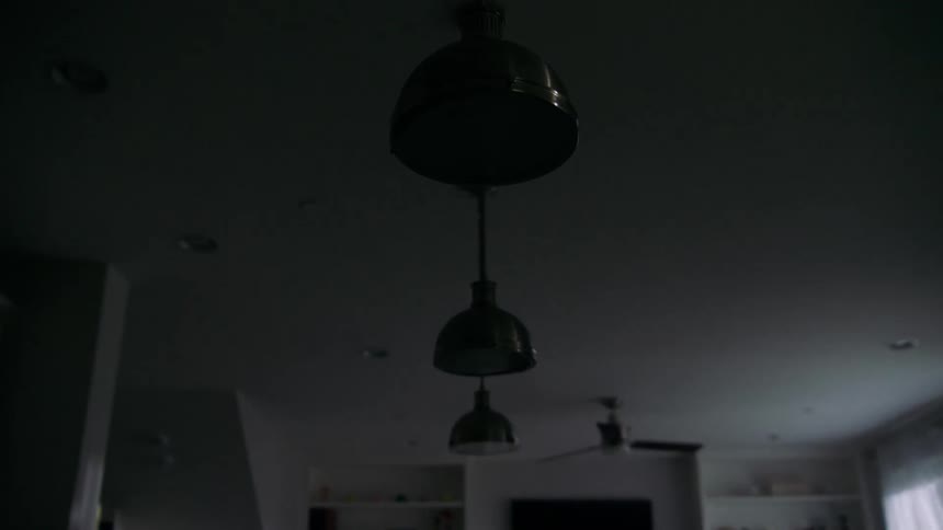 Lights turning on in a home