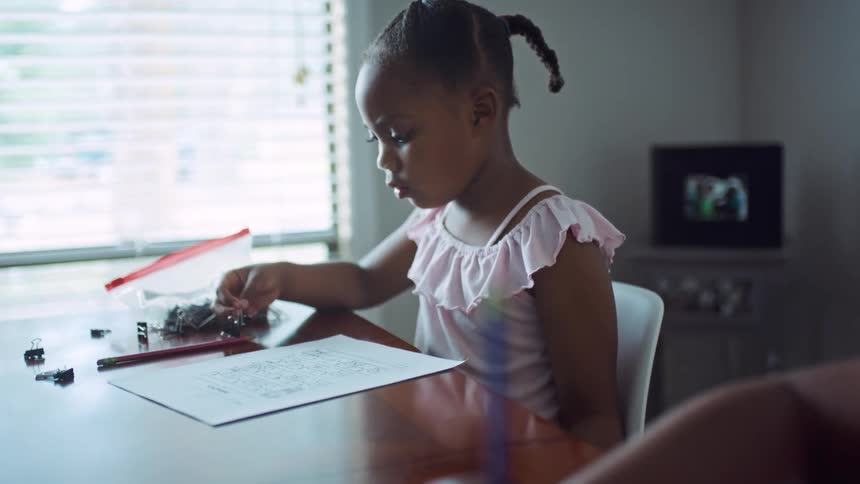 Two children do homework at home