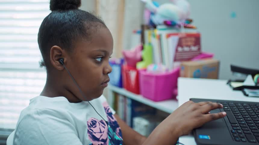A child using a laptop