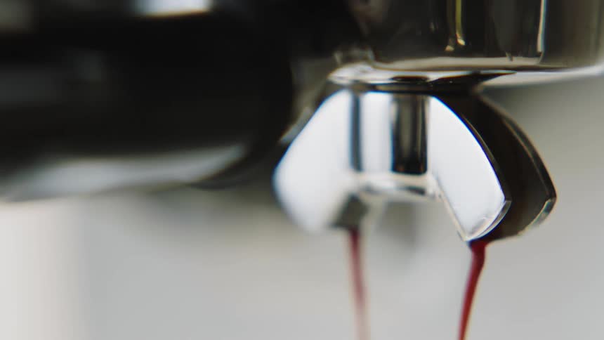 A coffee machine dispensing coffee