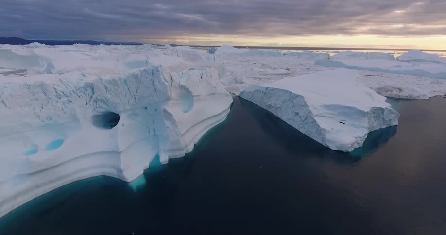 Snow and ice floating on water in the wilderness