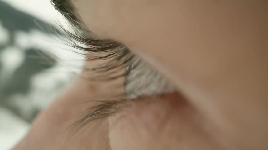 A close up of a blinking eye
