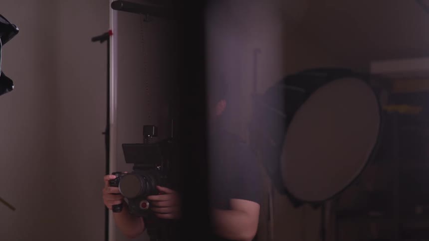 A photographer is talking and taking pictures