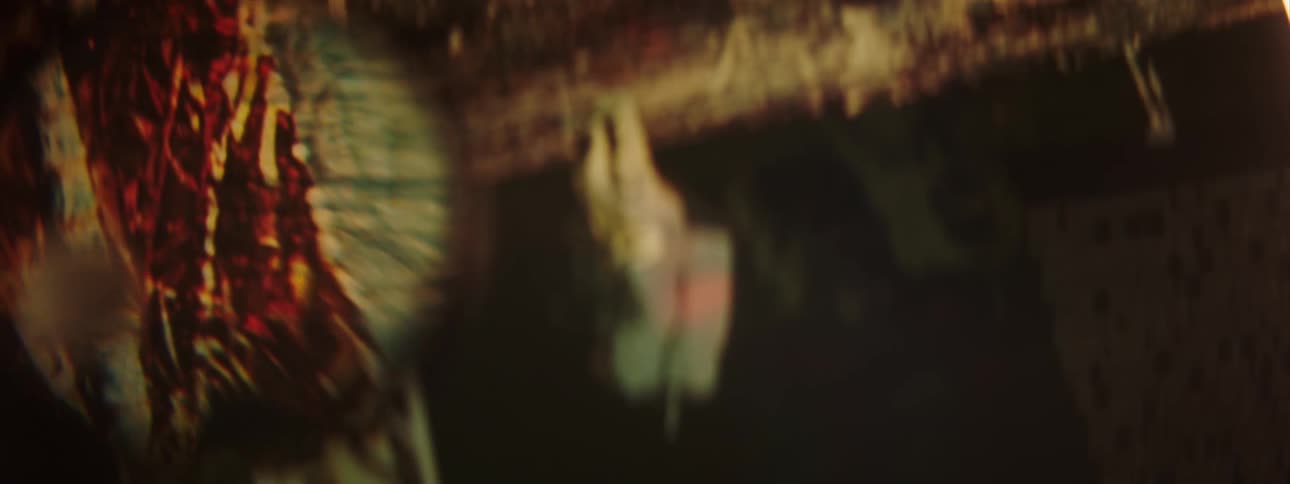 An object is being examined with a magnifying glass