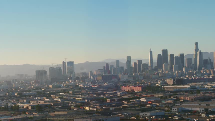 Fog is covering the buildings in the distance