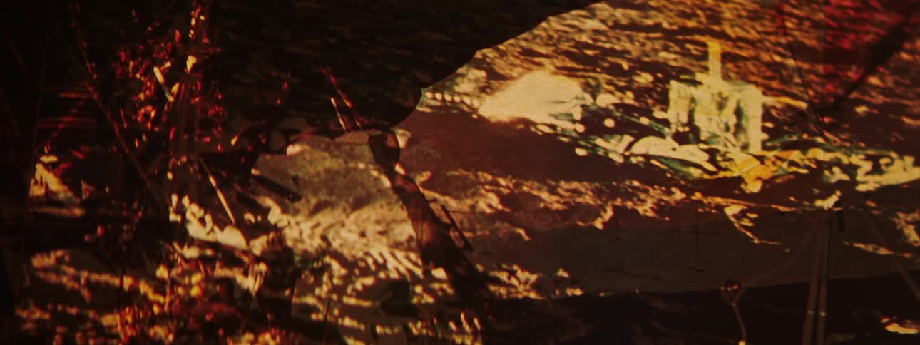 A negative viewer is lighting up a photograph