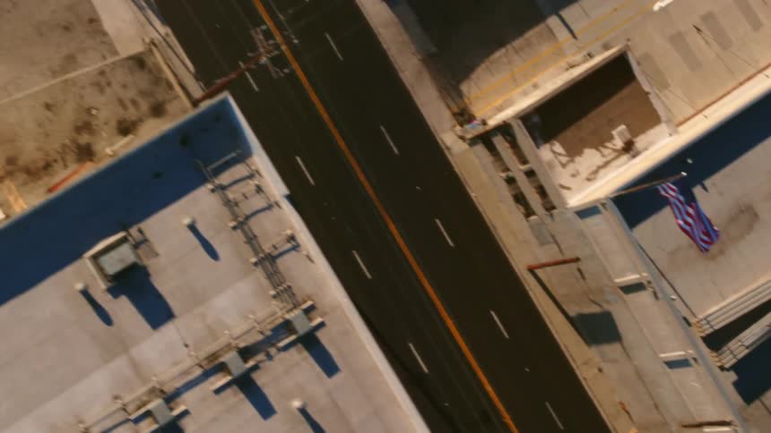 Top down aerial view of the buildings and warehouses on an industrial area