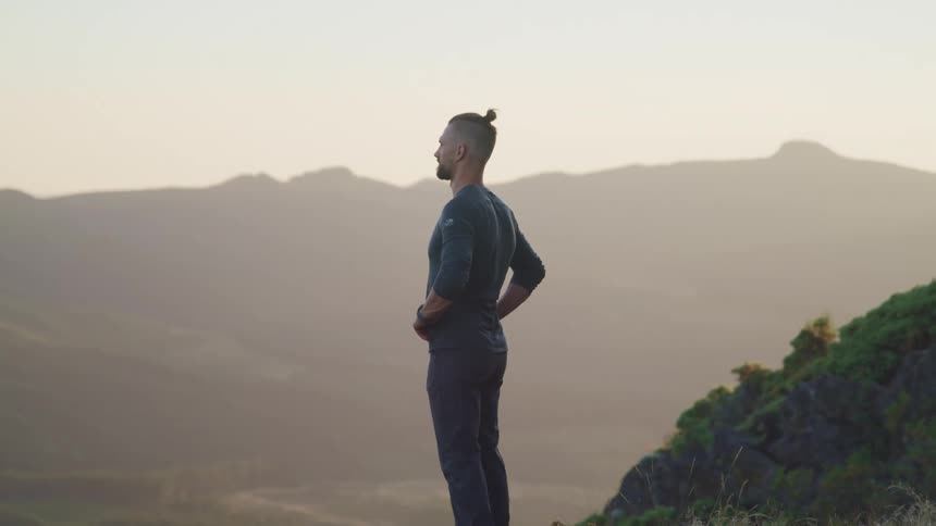 A man is standing on the mountain