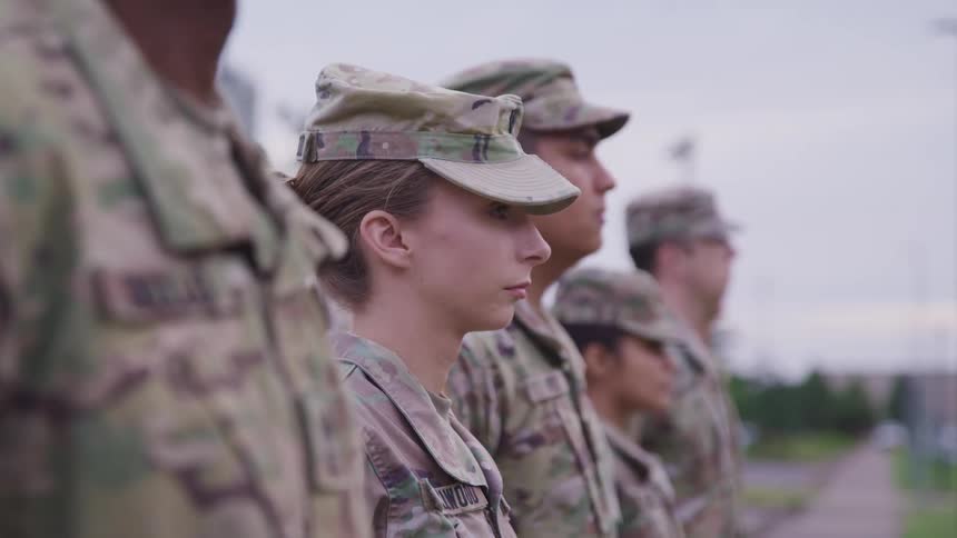 Military formation stands at attention