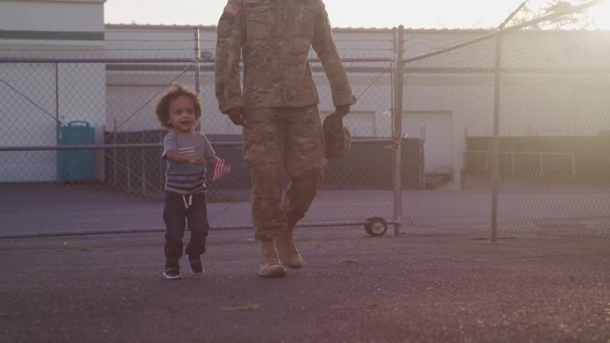 A father and son walking outdoors