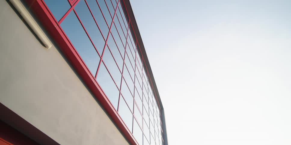 The building is lined with windows