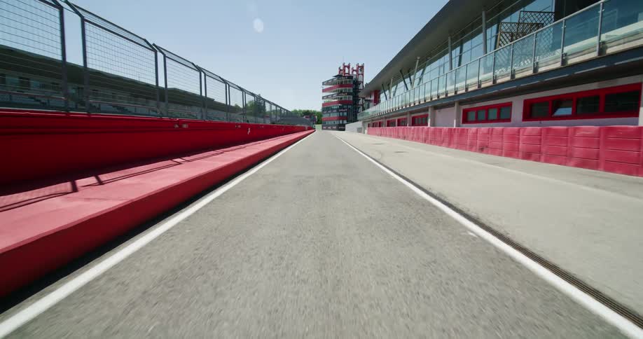 A view of driving out of a pit lane at a race track