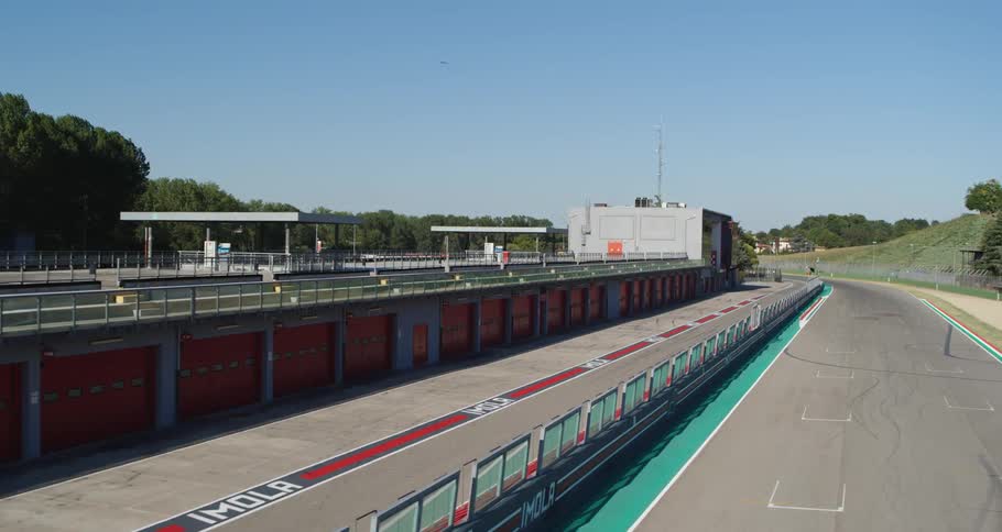 A view of a race track and buildings