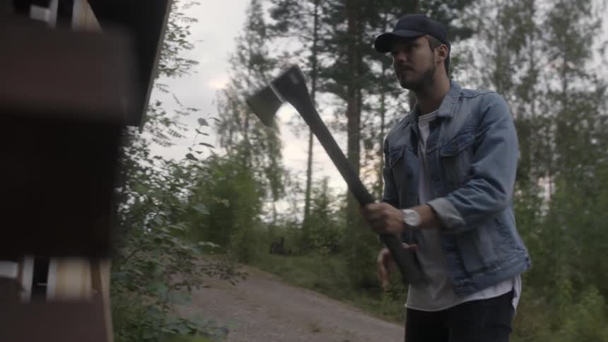 A man swinging an axe