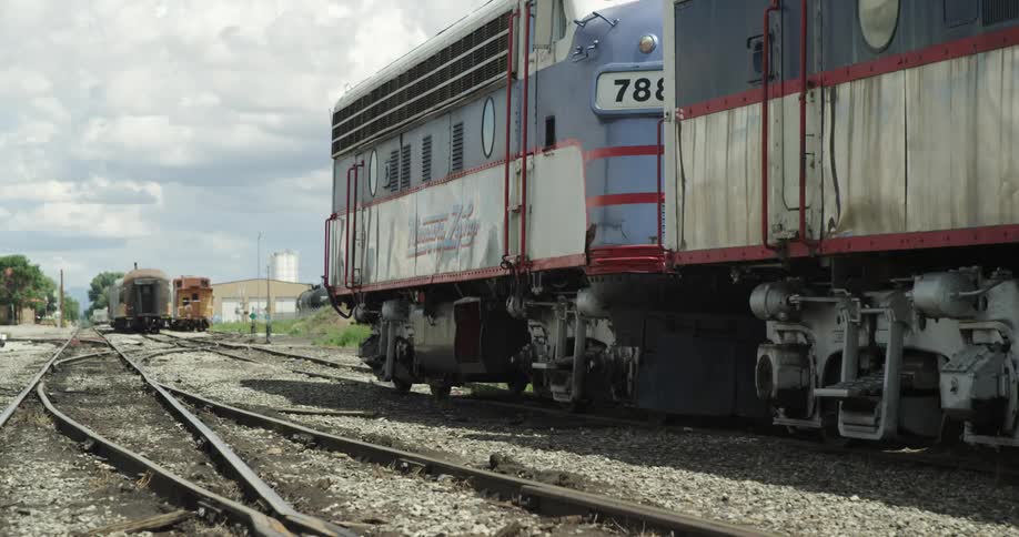 A train sitting on railway tracks