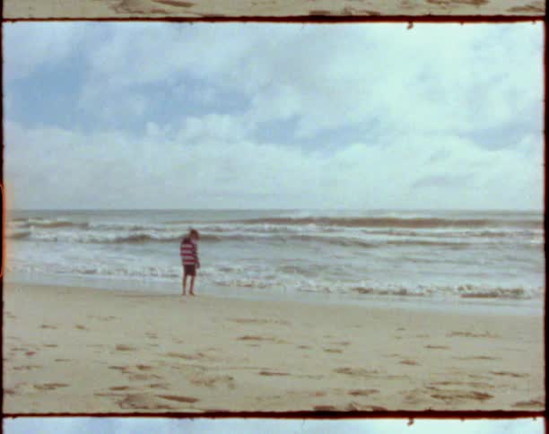 A child at the beach on a sunny day