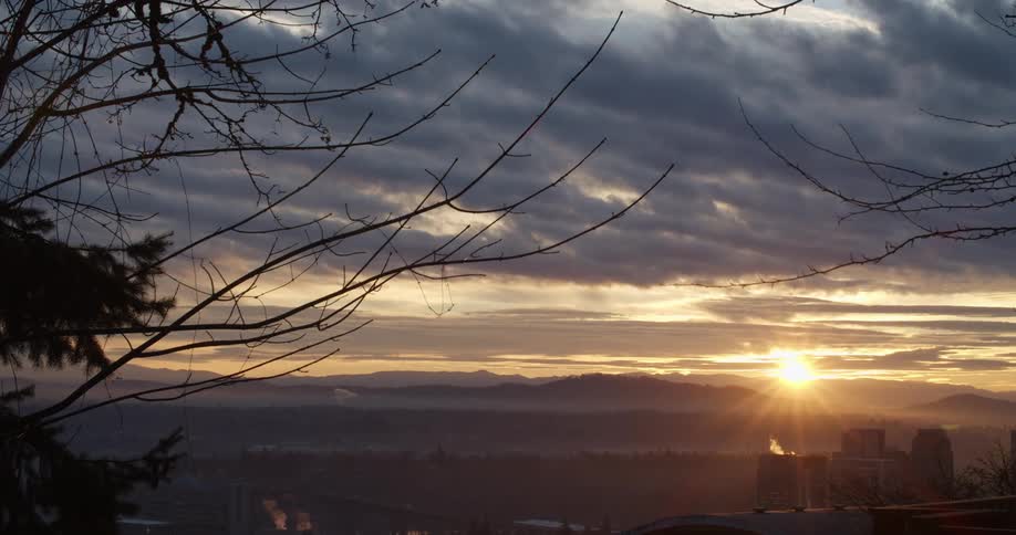 Clouds floating over the horizon at sunrise