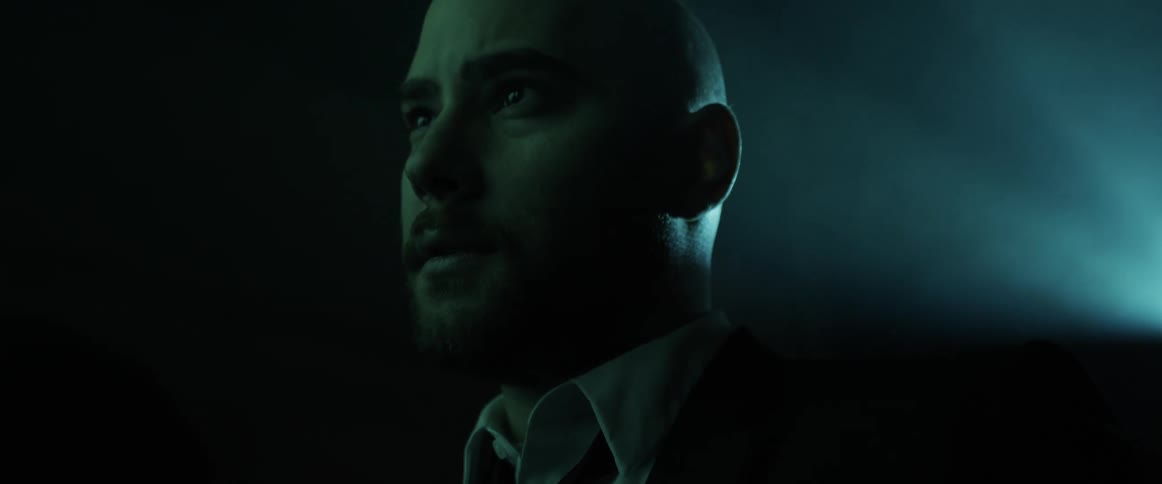 A man standing and staring into the distance