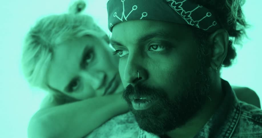 A portrait of a man and woman in a room with led lighting