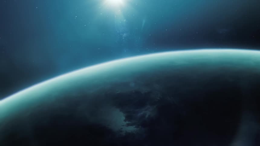 Sun rising over the horizon a planet seen from space
