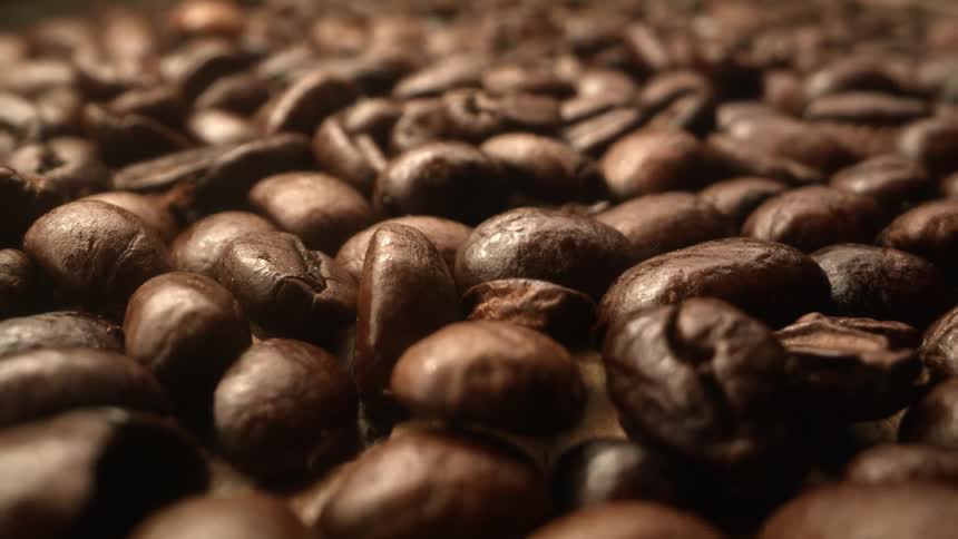 A view of coffee beans sitting on a table