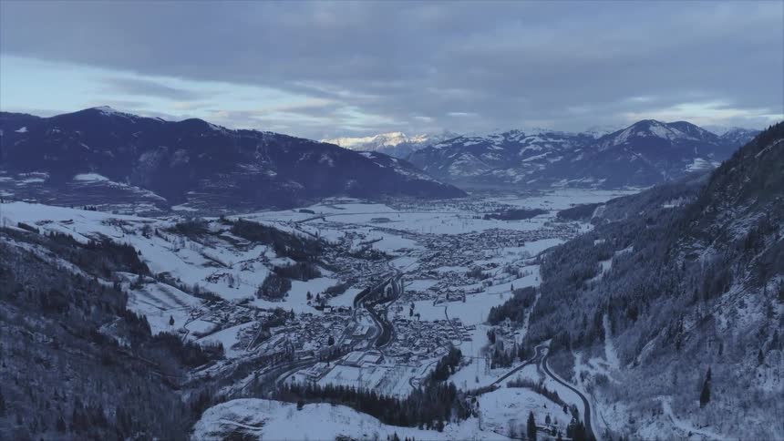 An aerial view of a mountain range and valley