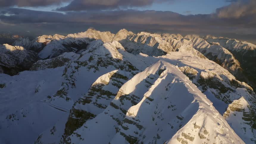 The mountain range is covered in snow