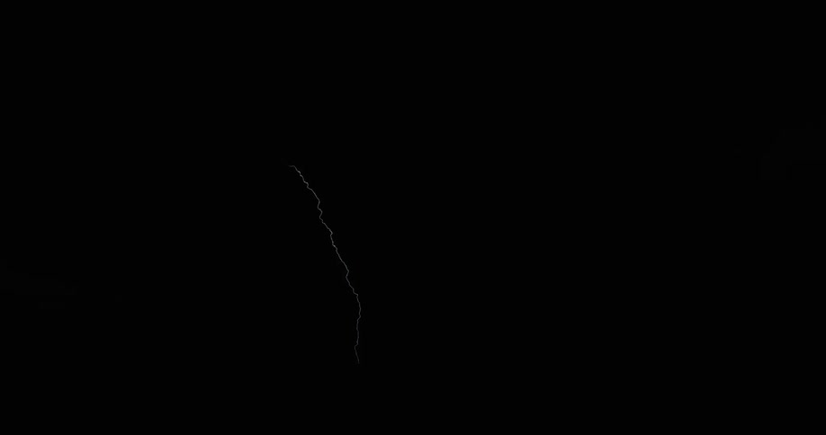 Lightning illuminating a dark sky during a storm