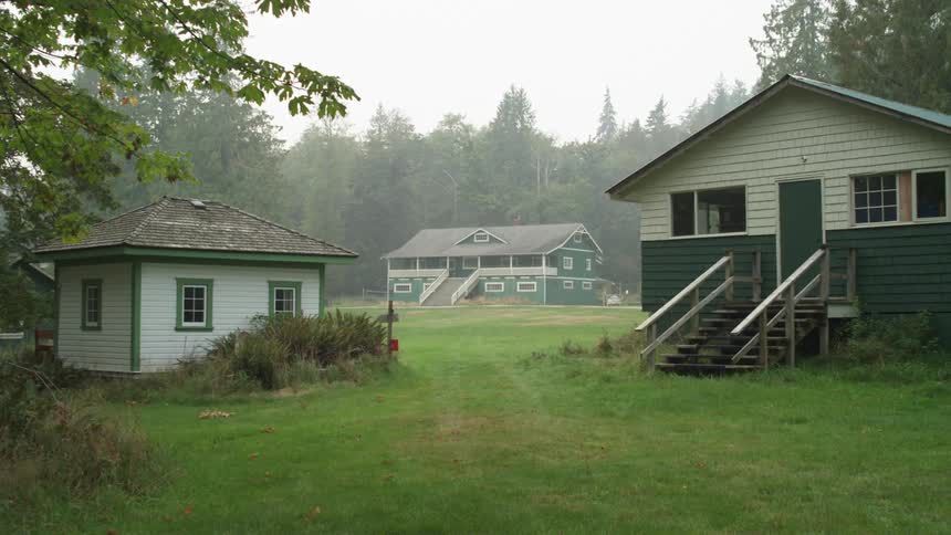 A house is shown with a backyard during spring