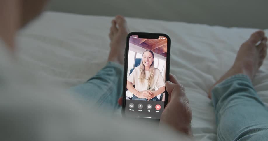 Two people talk on the phone with video
