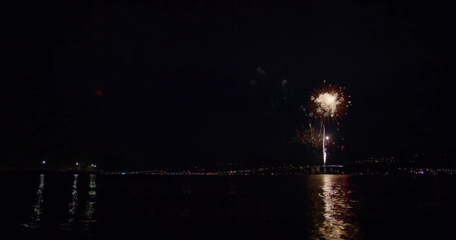Fireworks explode over the bay