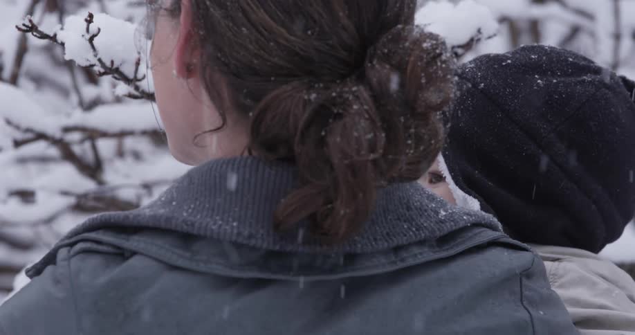 Mom And Baby In The Snow