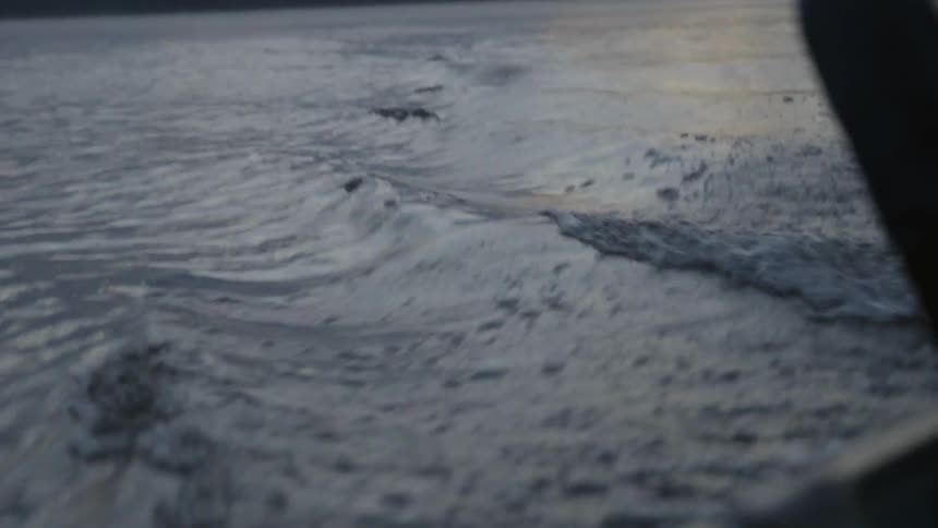 Bow of a boat creating waves