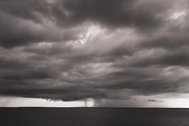 A time lapse of a storm forming and raining