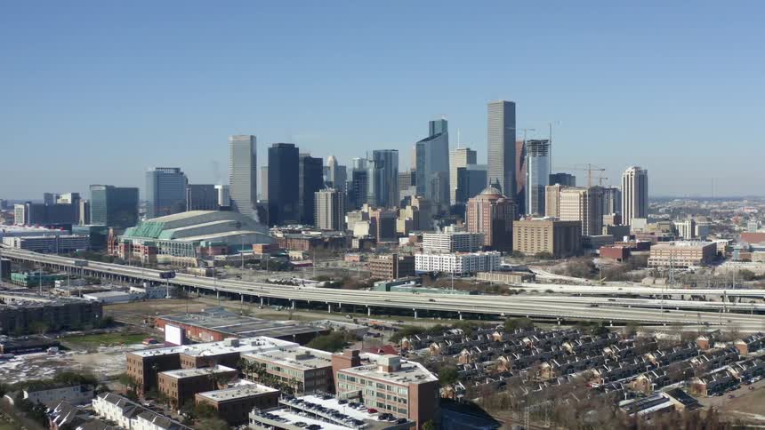 The sky is clear over the large city